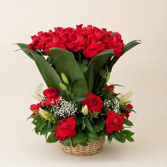 Fifty red roses with white lilies and lush greenery