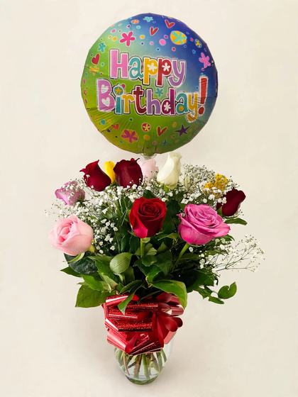 Red, pink, white and yellow roses with baby's breath and a Happy Birthday balloon