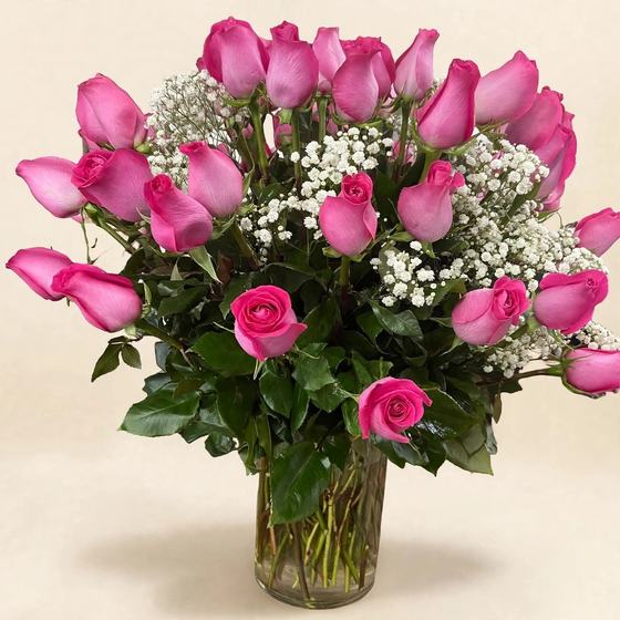 Large pink rose bouquet with white accent flowers