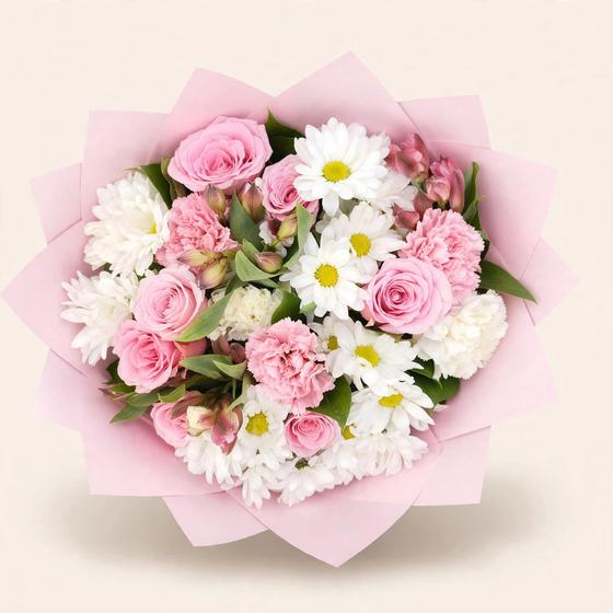 Pink roses, white daisies and pink carnations in pink wrap