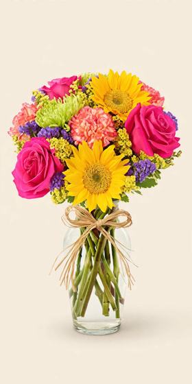 Sunflower Fiesta Bouquet with sunflowers, hot pink roses and purple blooms on a cream background