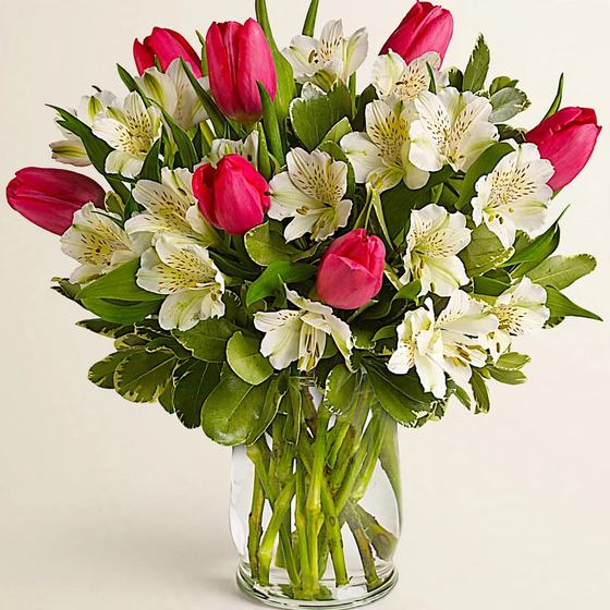 Tulip Whispers Bouquet with pink tulips and white alstroemeria on a cream background